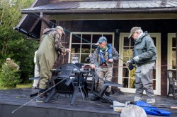 ON THE FRONT PORCH GETTING READY TO GO OUT FOR THE AFTERNOON AND EVENING FISHING