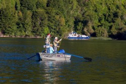 SKIFFS IN LAKE HAVE CASTING PLATFORMS FORE AND AFT - PUMA II IN BACKGROUND - VERY EFFICIENT WAY TO FISH LAKE YELCHO