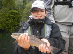 CRISTOBAL WITH A BROWN TROUT - YELCHO RIVER
