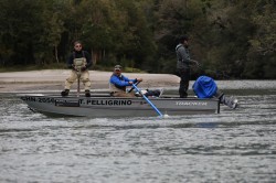 A SPIN ANGLER AND A FLY FISHING ANGLER