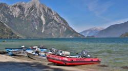 BOATS PULLED UP ON BEACH ON LAKE YELCHO FOR ASADO (BARBECUE)