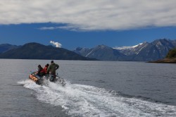 HEADING HOME FROM THE OCEAN - NOTE STEAM FROM THE CHAITEN VOLCANO IN DISTANCE