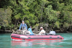 HEADING UP THE RIVER IN CUSTOMIZED BOAT