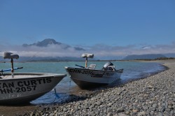 TWO IF THE SKIFFS AT THE BAY OF CHAITEN