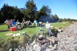 PREPARING RUSSIAN FISH SOUP ON THE BANK OF THE YELCHO RIVER AT THE LODGE - A HIGHLY SOCIAL EVENT