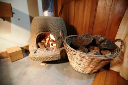 SMALL FIREPLACE IN PRIVATE CABANA