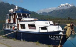 PUMA II AT DOCK - PUERTO CARDENAS - LAKE YELCHO