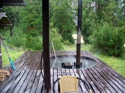 HOT TUB ON FRONT PORCH AT LODGE
