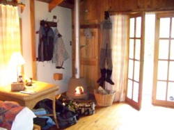 SMALL FIREPLACE IN CABANA AT LODGE