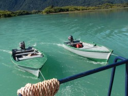 TWO SKIFFS BEHIND PUMA II