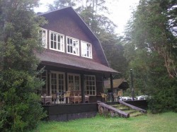 FRONT OF LODGE WITH CABANA AND HOT TUB