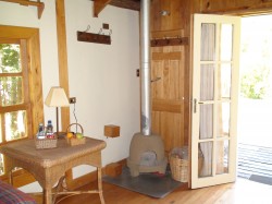 SMALL FIREPLACE IN PRIVATE CABANA - LODGE LAKE YELCHO