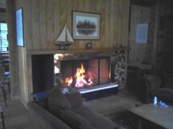 FIREPLACE IN LIVING ROOM AT LODGE ON YELCHO RIVER