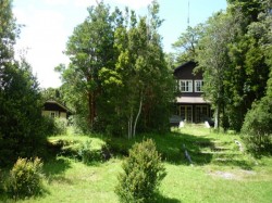 LODGE ON YELCHO RIVER FROM THE BEACH -- NOTE ONE OF THE TWO PRIVATE CABANAS AT THE LEFT