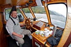 CAPTAIN PATRICIO IN THE WHEEL HOUSE