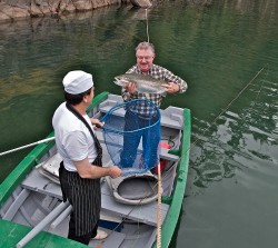 PAT FORD, HIS 14 LB RAINBOW AND GUIDE CHEF LUIS