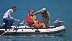 SWIMS WITH RAINBOWS (CAPTAIN BILL CURTIS)-WAS THE WATER COLD?
