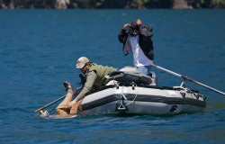 SWIMMS WITH RAINBOWS (CAPTAIN BILL CURTIS)-HOLY SHIT! PAT FORD FROZE ON THE CAMERA AND DID NOT GET THE SPLASH -THANK GOD RONNIE CAUGHT BILL'S PANT LEG